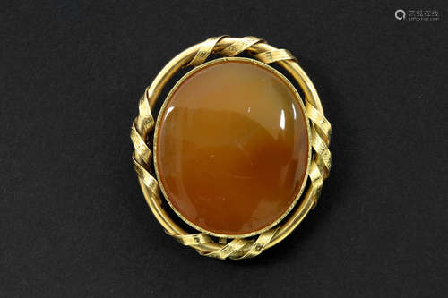 antique brooch/pendant in yellow gold (18 carat) with a quite big plaque of carnelian