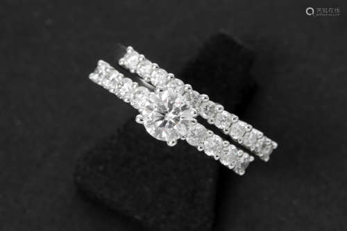 set of two rings in white gold : one with ca 0,70 carat of high quality brilliant cut diamonds & one with one ca 0,50 carat high quality brilliant cut diamond