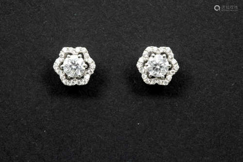 pair of earrings in white gold (18 carat) with ca 0,70 carat of high quality brilliant cut diamonds