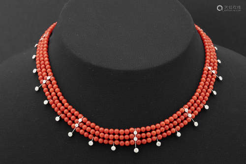 necklace in white gold (18 carat) with two rows of beads in red coral (with nice color) and ca 0,70 carat of brilliant cut diamonds