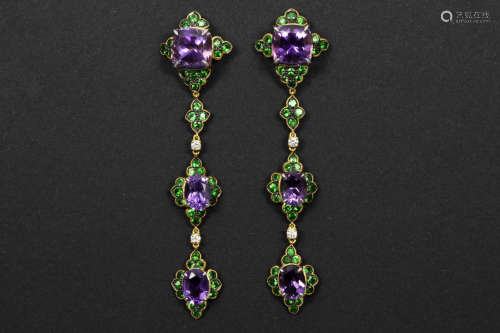 superb pair of handmade earrings in gold (18 carat) with more then 15 carat of tsavarite and amethyst and at least 0,20 carat of high quality brilliant cut diamonds