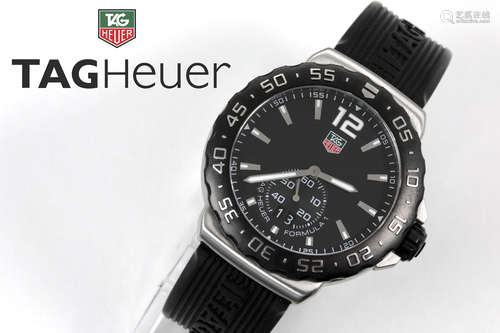 completely original quartz “Tag Heuer Formule 1” wristwatch in steel with rubber wristband – marked