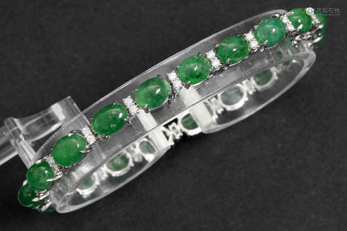 bracelet in white gold (18 carat) with ca 15 carat of oval cabochons in emerald and ca 0,60 carat of very high quality brilliant cut diamonds