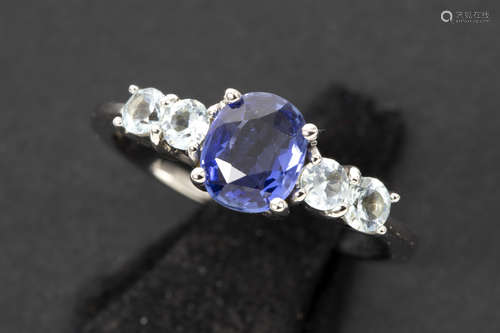 ring in white gold (18 carat) with a ca 1,70 carat sapphire with natural color and ca 0,30 carat of aquamarine