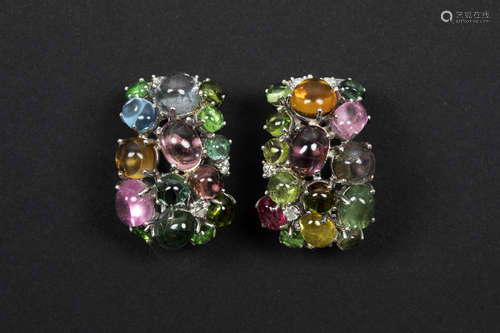 pair of very nice, completely handmade earrings in white gold (18 carat) with at least 36 carat of cabochon cut tourmalines in different colors and with at least 0,75 carat of high quality brilliant cut diamonds