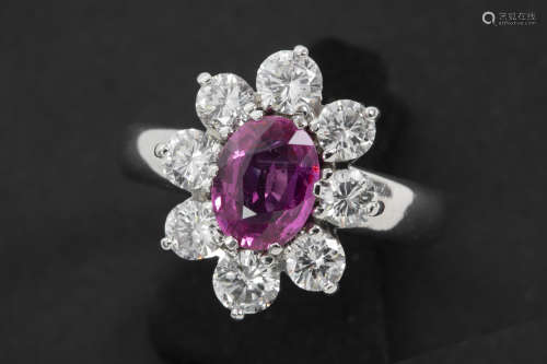 ring in platinum with a 1,60 carat non-treated pink sapphire from Mozambique, surrounded by ca 1,30 carat of very high quality brilliant cut diamonds – with “GIA” certificate for the sapphire