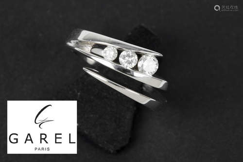 ”Garel” ring (snake design) in white gold (18 carat) with ca 0,45 carat of high quality brilliant cut diamonds – signed