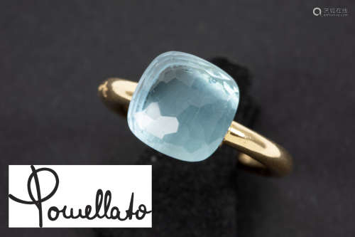 ”Pomellato” ring in yellow gold (18 carat) with a faceted cabochon cut blue topaz – signed