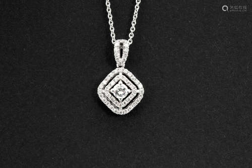 matching necklace with pendant in white gold (18 carat) and with ca 0,40 carat of very high quality brilliant cut diamonds