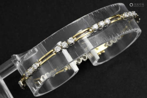 bracelet in yellow and white gold (18 carat) with ca 2 carat of very high quality brilliant cut diamonds