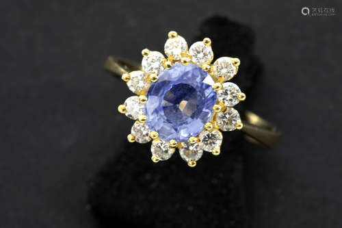 ring in yellow gold (18 carat) with a ca 1,30 carat sapphire from Ceylan and ca 0,50 carat of high quality brilliant cut diamonds