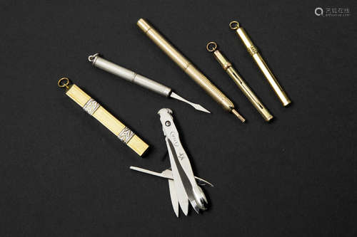 five pendants, one with a lead-pencil and four with toothpick