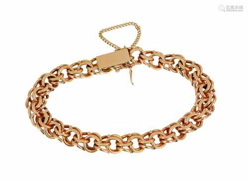 14-kt gouden schakelarmband. Tot. gew. ca. 32,5 g.