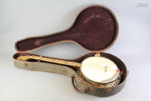 A Vintage (1921-1931) Four String Nonpareil Pearloid Tenor Banjo