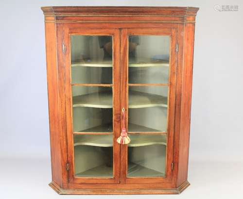 A Mahogany George III Corner Cabinet