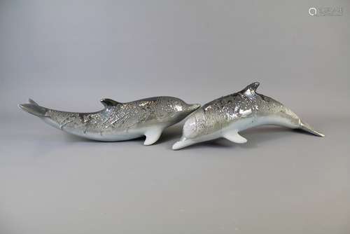 A Pair of Silver-Grey Glazed Porcelain Dolphins