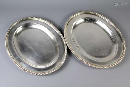 A Pair of Silver Dishes