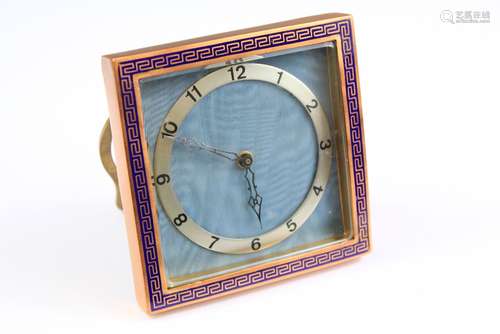 A Swiss 8-Day Brass and Enamel Strut Clock