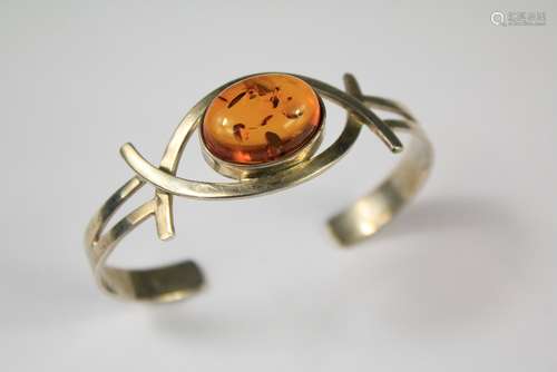 A Ladies Silver and Amber Bangle