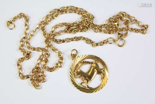 A 9ct Gold Zodiac Capricorn Pendant and Chain