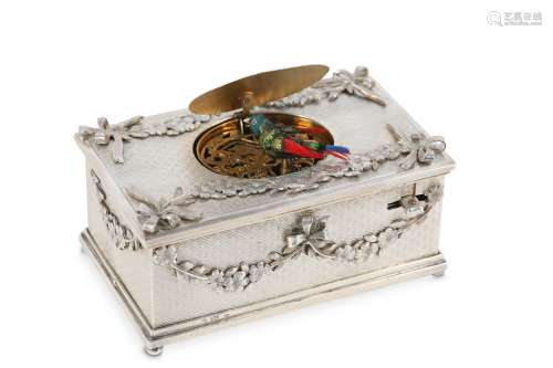 AN EARLY 20TH CENTURY SWISS SILVER SINGING BIRD BOX  the rectangular box decorated with ribbon