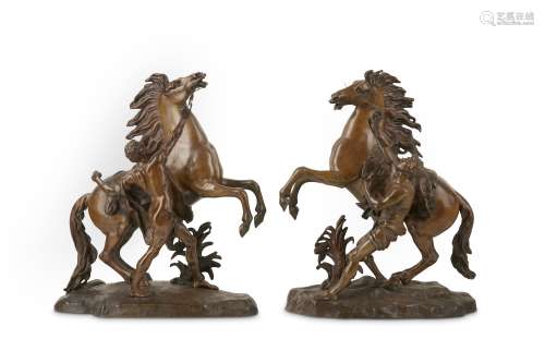 AFTER GUILLAUME COUSTOU THE ELDER (FRENCH, 1677-1746): A PAIR OF LATE 19TH CENTURY FRENCH BRONZE