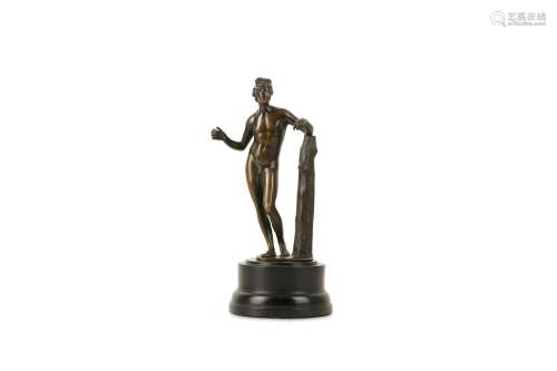 A LATE 18TH / EARLY 19TH CENTURY BRONZE STATUETTE OF APOLLO the standing nude figure with left arm