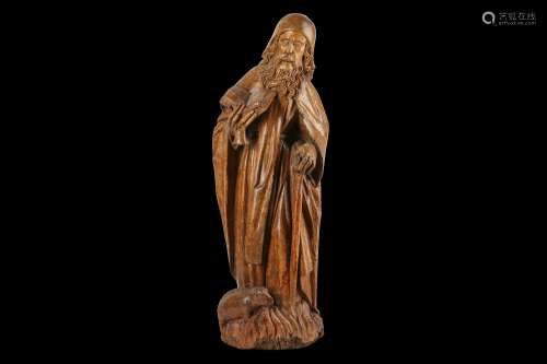 A LATE 15TH CENTURY GERMAN CARVED WALNUT FIGURE OF SAINT ANTHONY THE HERMIT the standing figure with