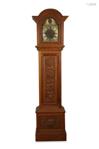 A LATE 19TH CENTURY CARVED OAK TRIPLE TRAIN QUARTER CHIMING LONGCASE CLOCK the case carved