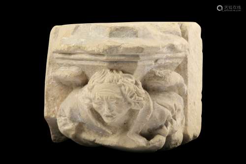A LATE 15TH CENTURY FRENCH CARVED LIMESTONE FIGURAL CORBEL, PROBABLY BURGUNDY the open mouthed angel