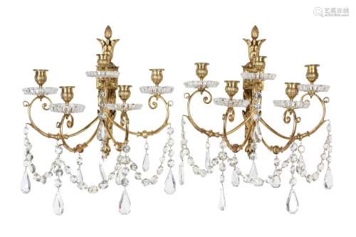 A PAIR OF BACCARAT LOUIS XVI STYLE GILT BRONZE AND CUT GLASS WALL LIGHTS the backplates modelled