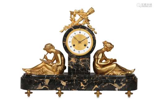 A 19TH / 20TH CENTURY FRENCH EMPIRE STYLE GILT BRONZE AND PORTOR MARBLE MANTEL CLOCK the marble case