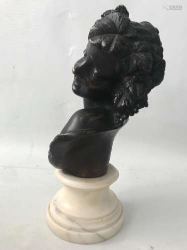 A LATE 19TH CENTURY FRENCH BRONZE BUST OF A BACCHIC MAIDEN the laughing girl with a headdress of