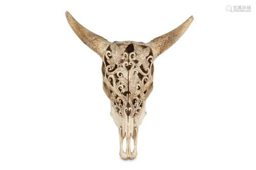 AN AMERICAN FOLK ART CARVED BISON SKULL the skull carved with three eagles with outstretched wings