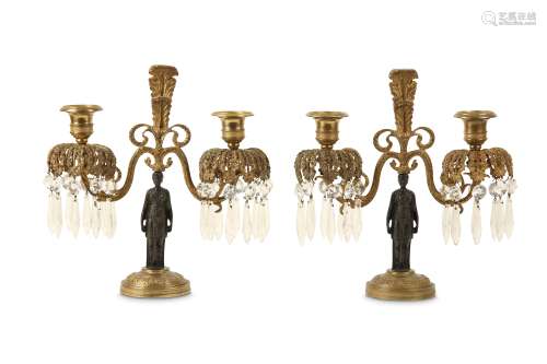 A PAIR OF REGENCY GILT AND PATINATED BRONZE FIGURAL CANDELABRA each raised on a classical maiden