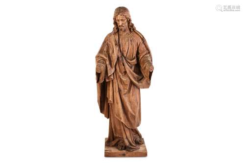 A LARGE 19TH CENTURY CONTINENTAL CARVED FRUITWOOD FIGURE OF CHRIST the standing figure looking
