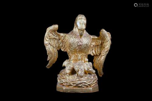 AN 18TH CENTURY GILTWOOD AND GESSO MODEL OF THE PELICAN IN HER PIETY the bird with outstretched