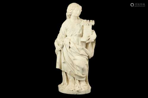 A 17TH CENTURY ITALIAN CARRARA MARBLE FIGURE OF ST BARBARA WITH HER TOWER holding her drapery in her
