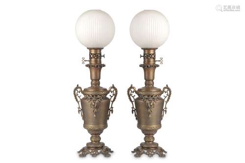A PAIR OF LATE 19TH CENTURY BRONZE LAMP BASES WITH GLASS SHADES the oil lamp bases with removable