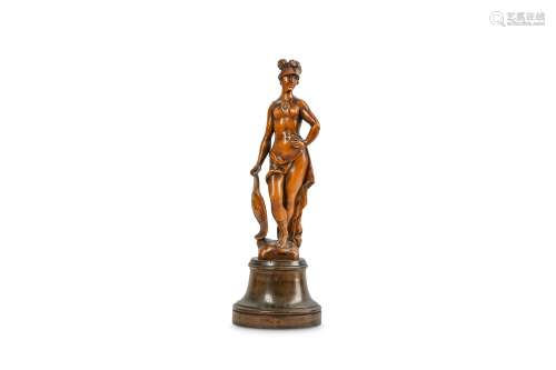 A 17TH CENTURY FLEMISH CARVED BOXWOOD FIGURE OF MINERVA the smiling goddess wearing a plumed helmet,