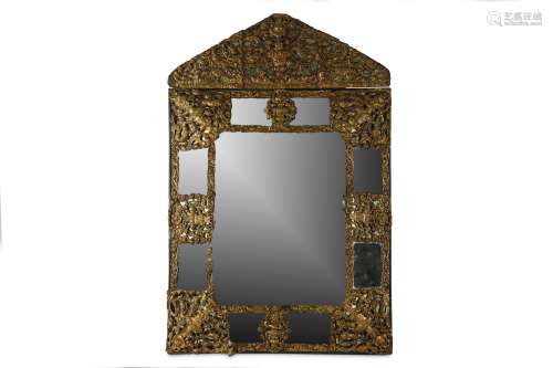 AN EARLY 18TH CENTURY FRENCH LOUIS XIV PERIOD REPOUSSE BRASS WALL MIRROR surmounted by a