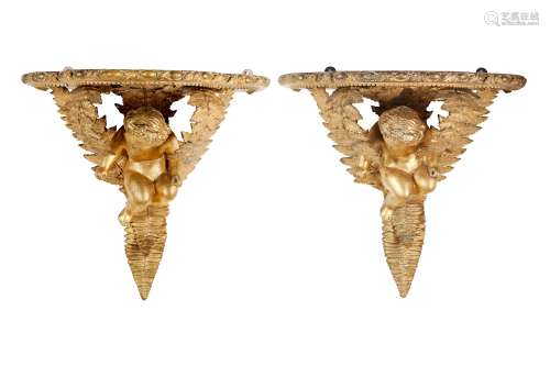 A PAIR OF 19TH CENTURY GILTWOOD AND GESSO FIGURAL WALL BRACKETS the shaped shelf tops with egg and