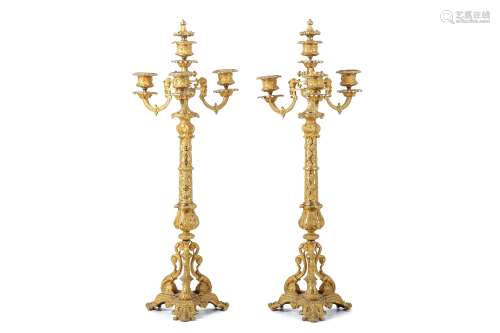 A PAIR OF LATE 19TH CENTURY FRENCH GILT BRONZE CANDELABRA in the Renaissance Revival style, the