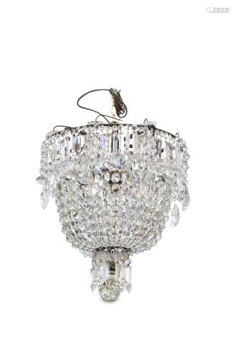 A LATE 19TH CENTURY CRYSTAL GLASS CHANDELIER the circular metal frame supporting chains of beaded