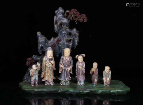 A SOAPSTONE CARVED COLOR FIGURES