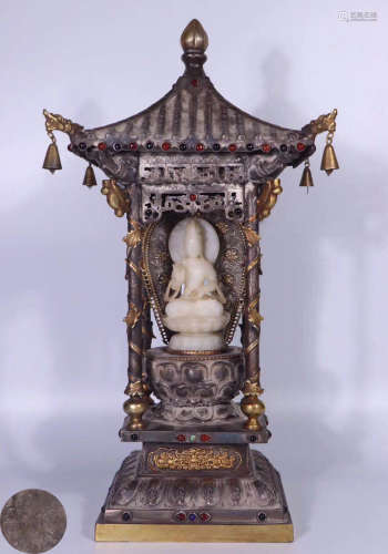 A WHITE JADE BUDDHA AND SILVER CONTAINER