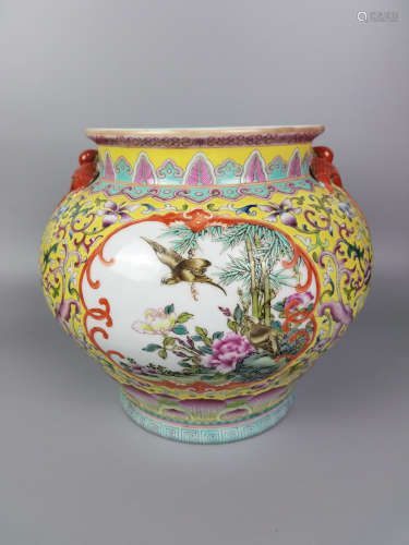 A ENAMELED FLORAL AND BIRD PATTERN ZUN VASE