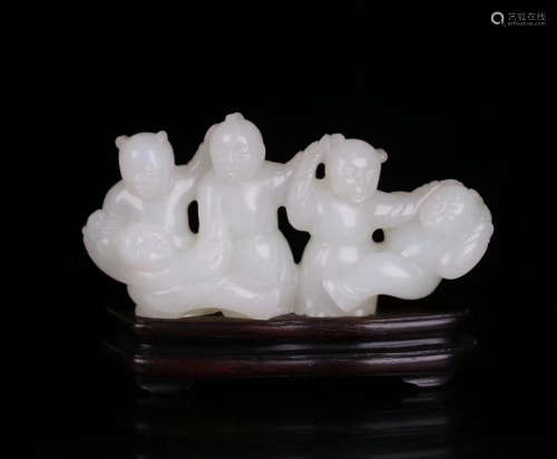 A HETIAN JADE BOYS SHAPED PEN HOLDER