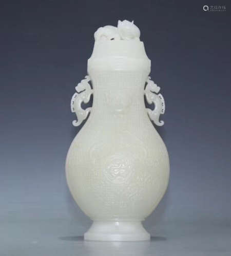 A HETIAN JADE CARVED BOTTLE VASE