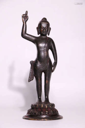A BRONZE CARVED STAND BUDDHA STATUE
